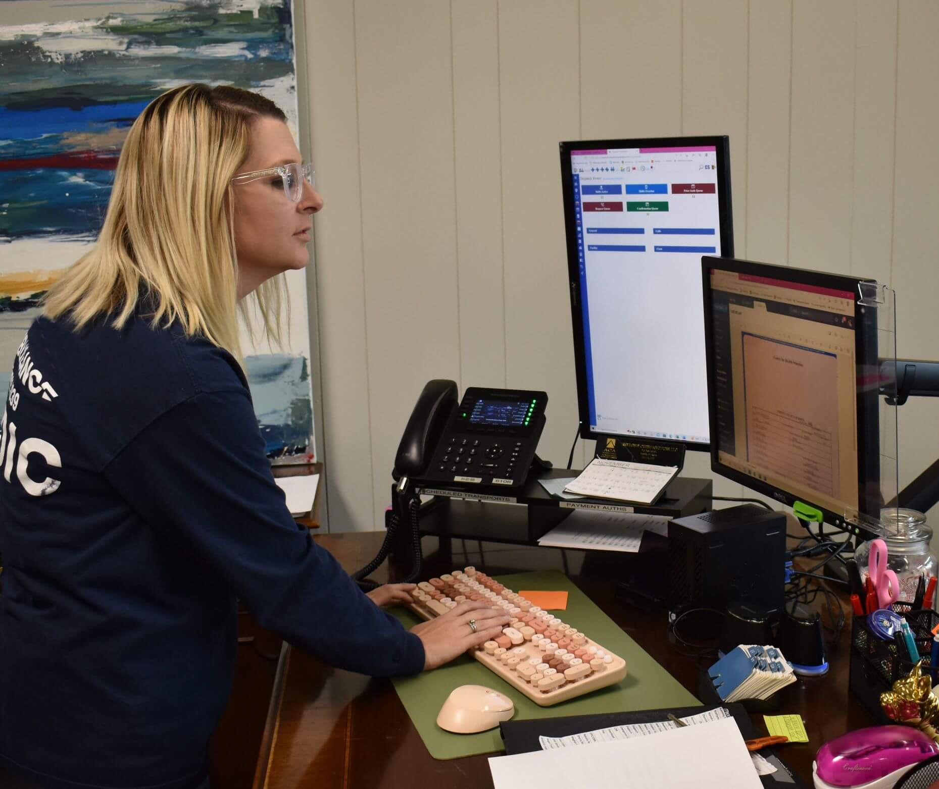 Woman in dispatch center managing reports