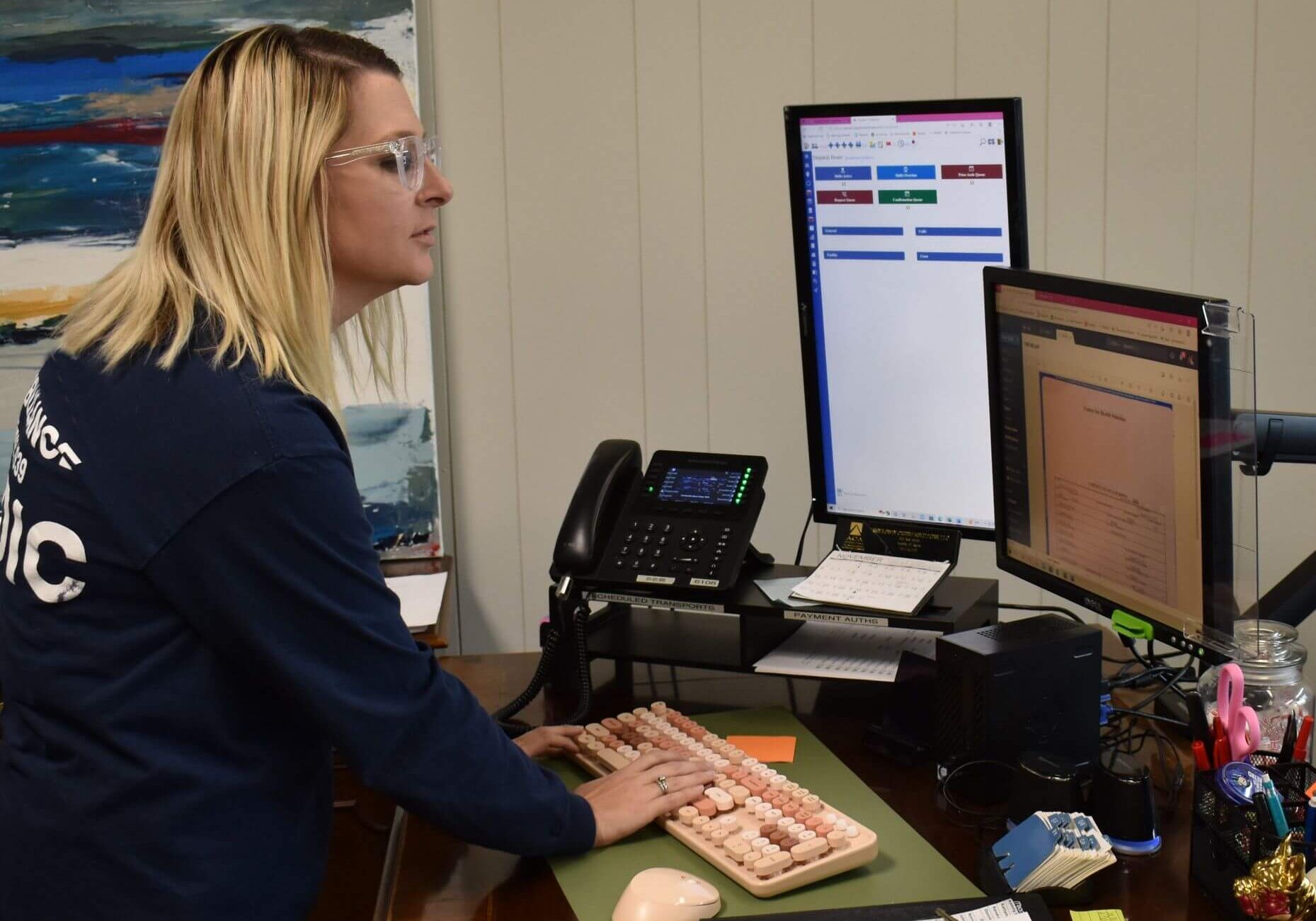 Woman in dispatch center managing reports
